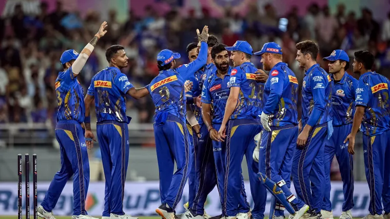 Mumbai Indians team huddle during IPL match